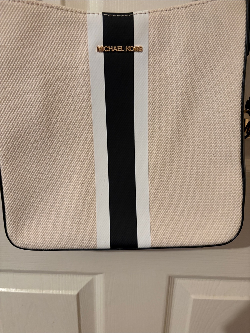 Mk  Beige Tote with Black and White Center Stripe. new w/o tags. Stiff until use
